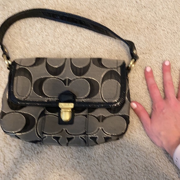 Black, gray, gold coach purse. Small scratch shown on buckle in picture. - Picture 8 of 8
